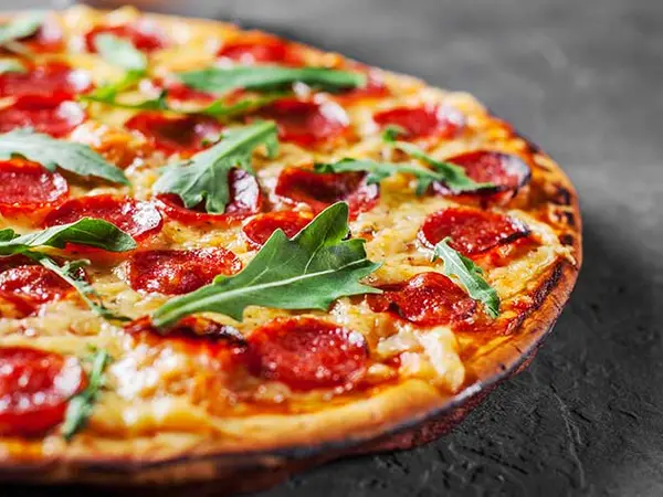 11 Pizza Jokes With Extra Cheese