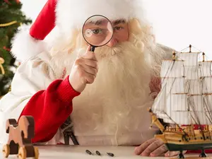 What do you get if you cross Father Christmas with a detective?