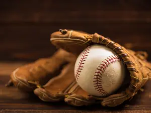 How long did the baseball player stay at the library?