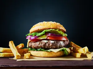 How many guys does it take to make a burger and fries?