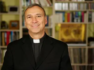 What do you call a priest that becomes a lawyer?