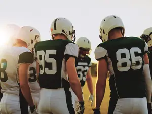 Where do sports teams go to buy new uniforms?