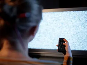 Why did the man buy the discounted TV with a broken volume control?