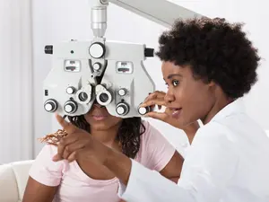 Why do moms have to visit the optometrist twice?